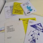 Photograph of a selection of documents relating to social enterprise